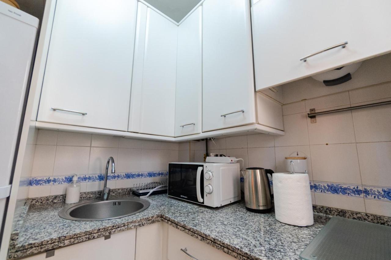 RentalSevilla a un minuto de la Campana Exterior foto